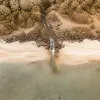 Trou d’Eau à La Réunion : lagon paisible, sable blanc et grands espaces entre plage et cascades